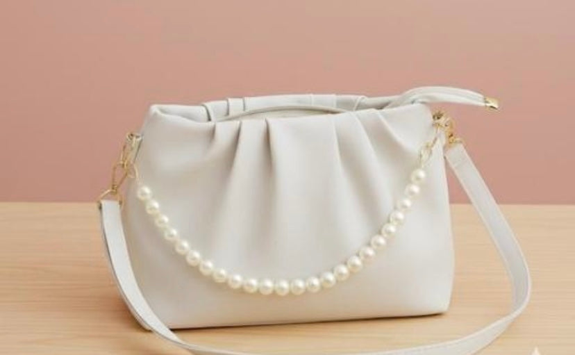 Trendy Pearl sling bag