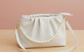 Trendy Pearl sling bag
